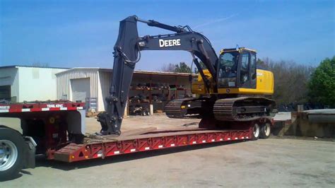 Trailer Loading a John Deere Compact Excavator 